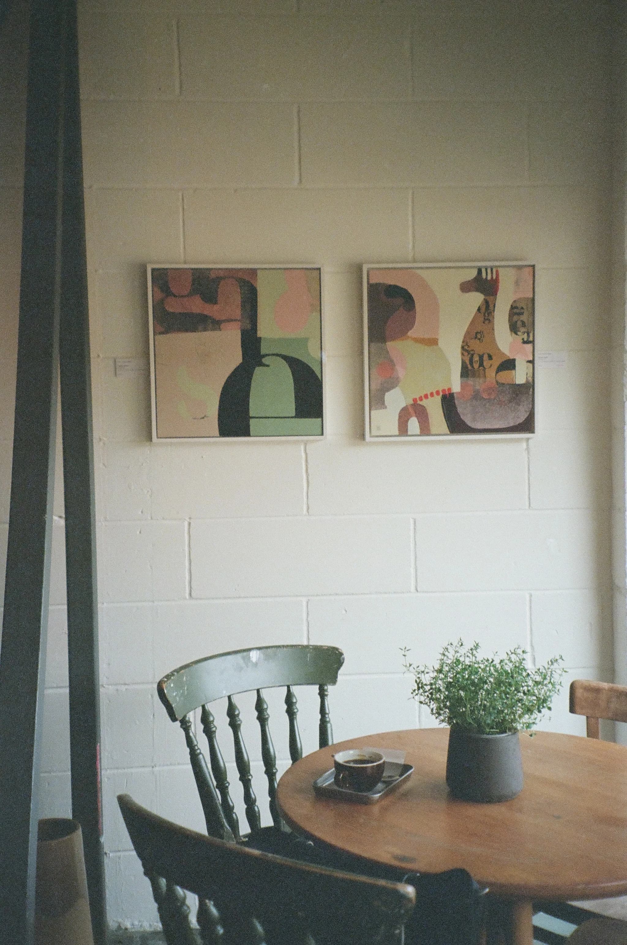 PRANA HOUSE table and chair with framed wall art